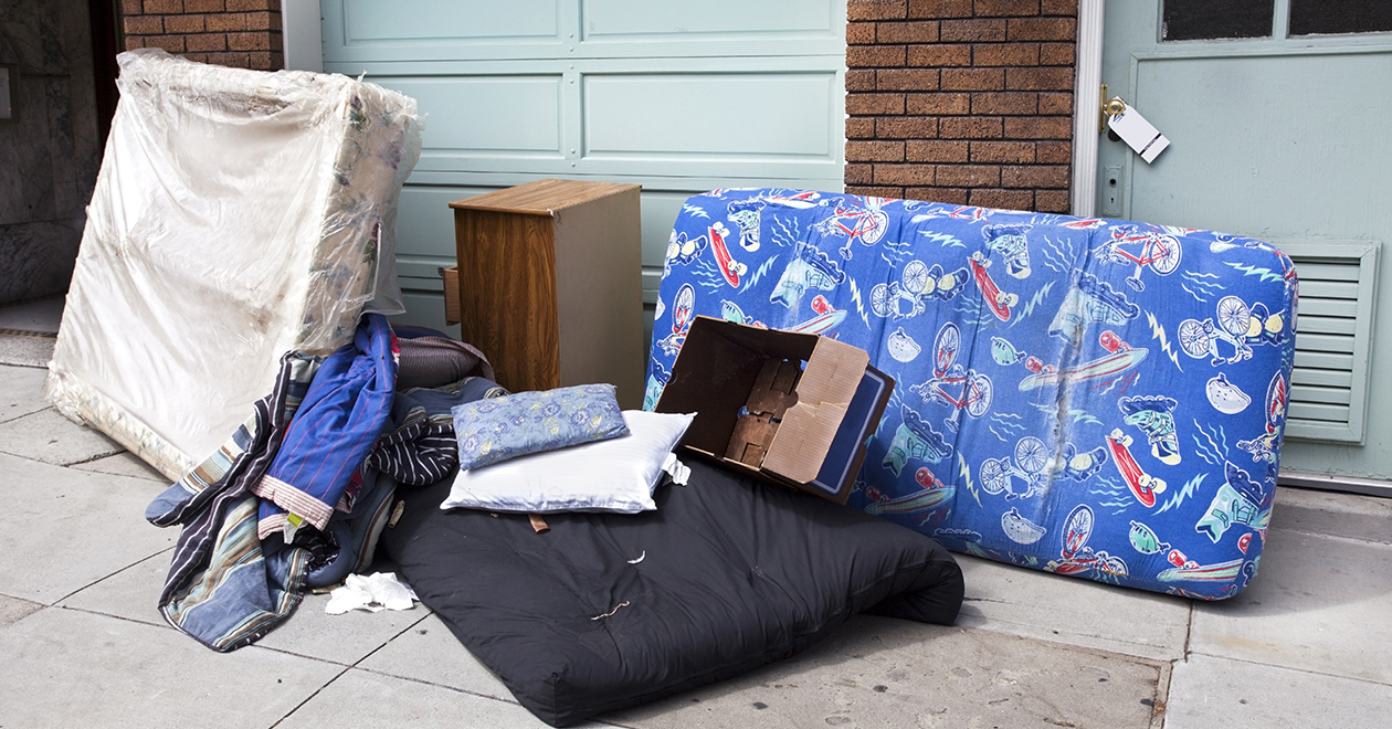 Mattress and bedding on the street