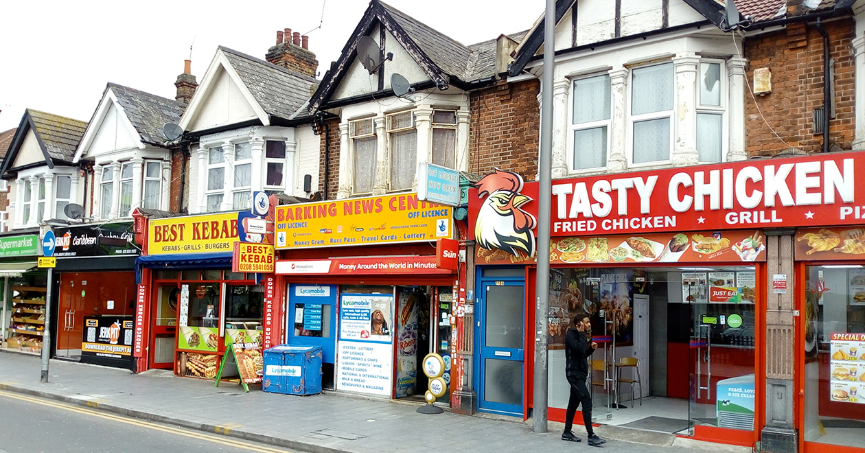Row of takeaways and shops