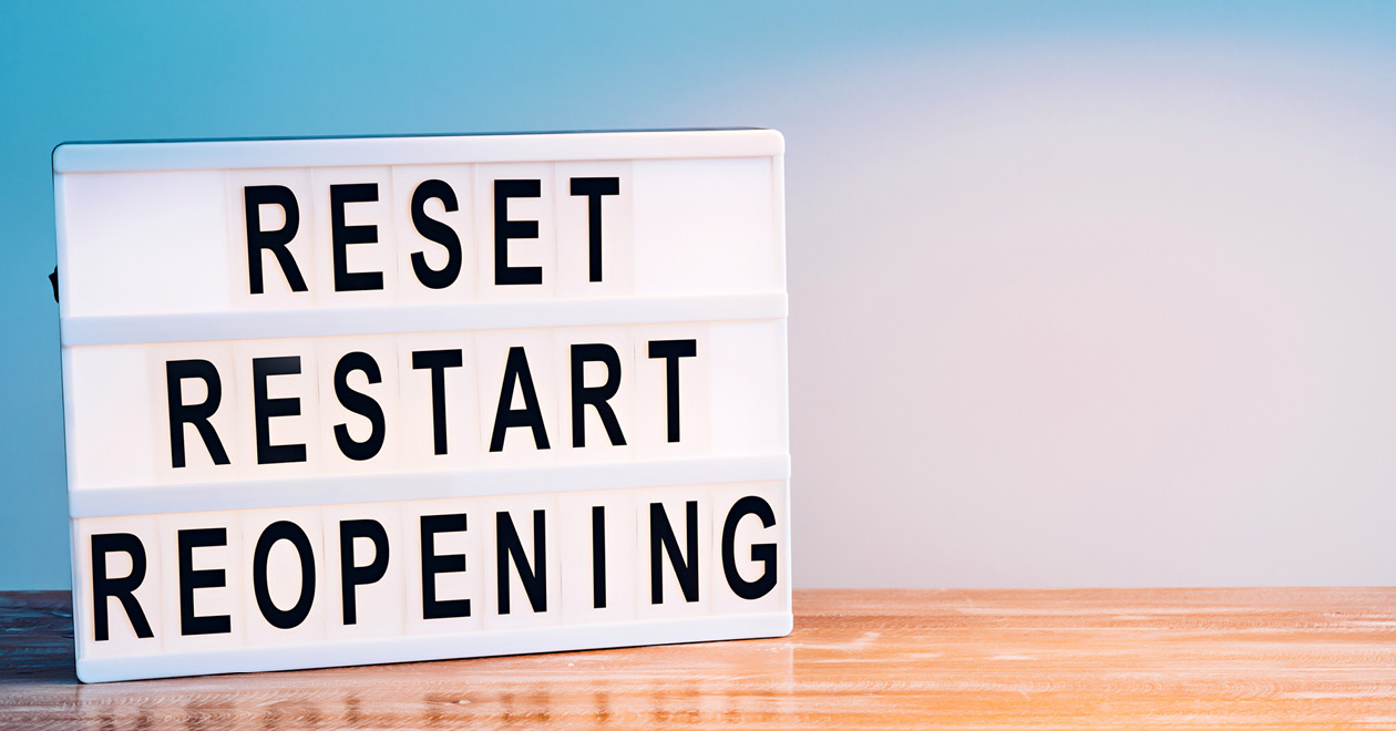 Sign reading 'Reset, Restart, Reopening'