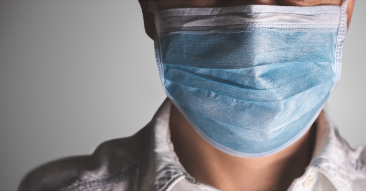 Close-up of a person wearing a mask