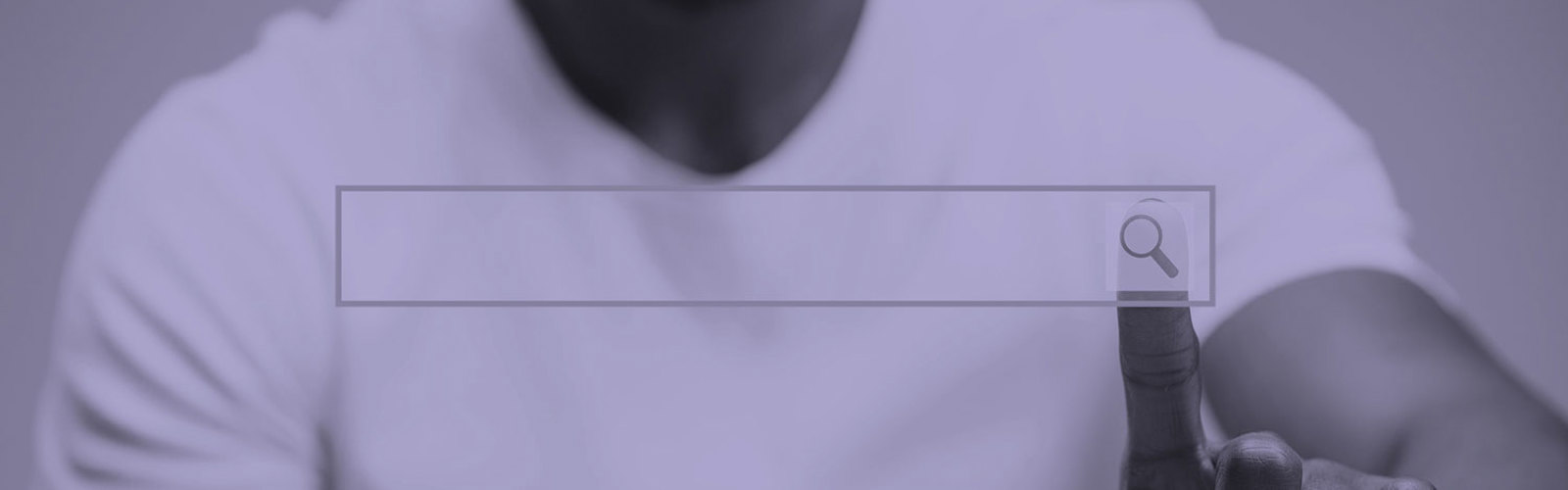 Person touching a search bar on a screen
