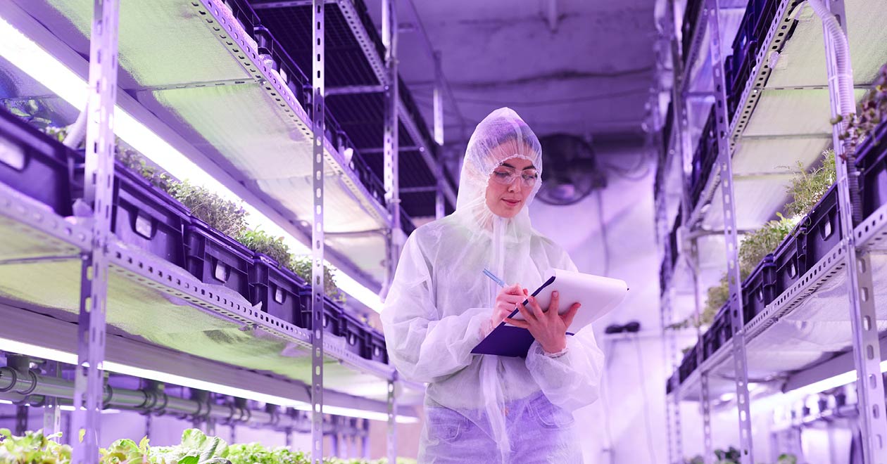 Woman environmental health professional with a clipboard